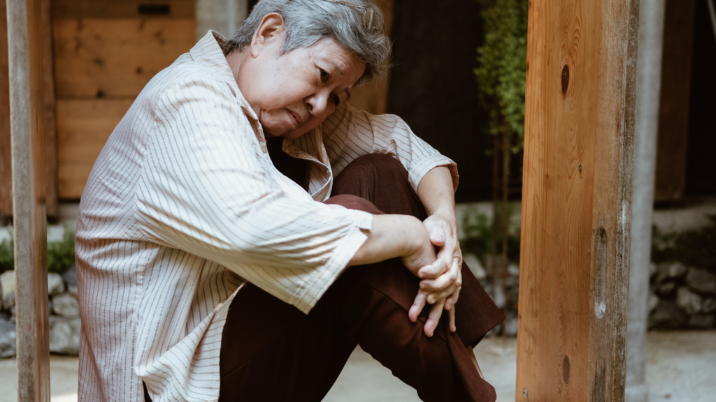 old woman showing signs of social isolation